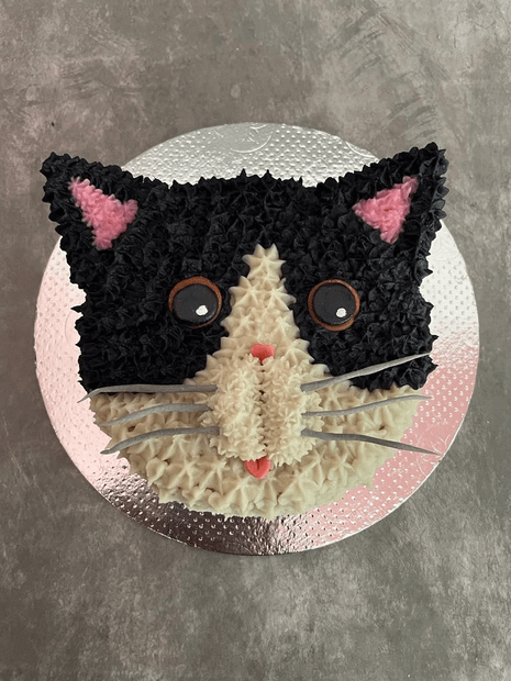 Adorable Cat Face Shape Cake - Customizable and Delicious