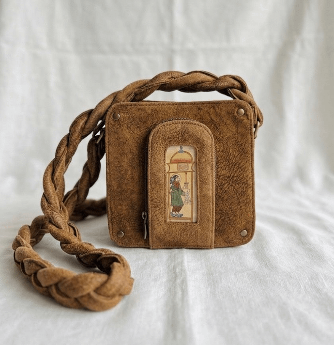 The wine doll sling